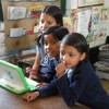 Girls share a 100-dollar laptop. Credit: Komathi A.L. 