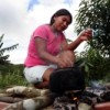 Woman at a cooking fire in the Cantagalo indigenous reserve in the southern state of Rio Grande do Sul.  Credit: Alejandro Arigón/IPS 