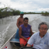 IPS correspondent in a boat with two locals on the Xingú River.  Credit: Mario Osava/IPS 