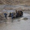 Caudalosa workers clean up mining tailings in the Opamayo River.  Credit: Milagros Salazar/IPS
