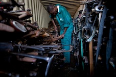 A gunsmith from the Sudan People's Liberation Army salvages guns seized in Juba, Sudan, in Jun 2010 during a government disarmament campaign. Credit: © Trevor Snapp/Small Arms Survey