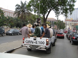 Chinese Labourers on their way to work in central Luanda. Credit: Louise Redvers/IPS