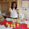 Yandi Condado shows off the Cacaloxúchitl cooperative's peanut products. Credit: Emilio Godoy/IPS