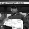 Isaac Nwankwere, who escaped from Nigeria, sells the Augustin street paper in Austria. Credit: Mario Lang/Augustin