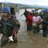 UN peacekeepers rescue Haitian children from an orphanage destroyed by Hurricane Ike in September 2008. Credit: UN Photo/Marco Dormino