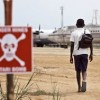 A child walking through the Bangboka airport. Credit:  Gwen Dubourthoumieu/IRIN