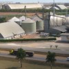Silos at the entrance to Lucas do Rio Verde, a centre of soy, corn and cotton production in Mato Grosso.  Credit: Mario Osava/IPS