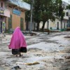 A woman walks through the deserted streets of Bakara Market in Mogadishu, until a few days ago a strategic stronghold of Al-Shabaab. Credit: UN Photo/Stuart Price