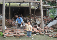 Picking up the pieces after the quake in Bailu town, Sichuan Province. Credit: Antoaneta Bezlova/IPS Picking up the pieces after the quake in Bailu town, Sichuan Province. Credit: Antoaneta Bezlova/IPS