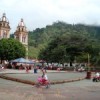 Cajamarca's central square, with a gold-rich mountain in the background. Credit: Helda Martínez/IPS