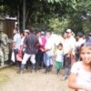 Peasant farmers lined up at military checkpoint on Caguán river. Credit: Courtesy of Lina María Martínez/Notimundo