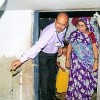 A Tata official turns on the tap for a low-income household in Jamshedpur township. Credit: Keya Acharya/IPS