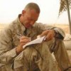 Jeff Key writes in his journal in Iraq. Credit: semperfithemovie.com