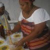 Mae Jaciara prepares typical Candomblé meal. Credit: Mara Vanessa Dutra/IPS.