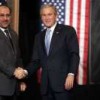 Al-Maliki and Bush at a Nov. 2006 press briefing in Amman, Jordan. Credit: White House/Paul Morse