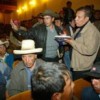 Marco Arana jots down concerns, complaints and demands of indigenous peasant farmers. Credit: Courtesy of La República