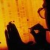 Studying the human DNA sequence. Credit: Photo Stock