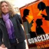 Women's rights activist María Eugenia Rojas holding a poster against political violence targeting women town councillors.  Credit: Franz Chávez/IPS