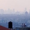 A view of Tel Aviv from a rooftop in Qalqilya. Credit: Daan Bauwens