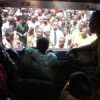 Burundian refugees on board the train in Katumba say final goodbyes, Mar. 9. Credit: Sarah McGregor/IPS