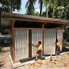 Boys use new latrines at Tulung Elementary School in Pundong Village in the earthquake-ravaged southern district of Bantul, Java.  Credit: UNICEF/HQ06-1845/Josh Estey