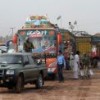 At Jalozai camp, 35 km northwest of Peshawar, a convoy of buses and trucks prepare to take IDPs home on Jul. 13 Credit: Ashfaq Yusufzai/IPS