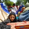 This family is among the lucky ones to flee Bajaur in a truck. Credit: Ashfaq Yusufzai/IPS