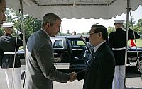 President George W. Bush shakes hands with Prime Minister Phan Van Khai of Vietnam as he departs the White House Tuesday, Jun. 21, 2005. Credit: White House photo by Eric Draper President George W. Bush shakes hands with Prime Minister Phan Van Khai of Vietnam as he departs the White House Tuesday, Jun. 21, 2005. Credit: White House photo by Eric Draper