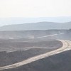 Dump trucks haul coal for export at the Cerrejon mine in northeastern Colombia.  Credit: Chris Arsenault