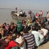 Victims of Cyclone Sidr waiting for help on the banks of a river in Barguna district  Credit: Farid Ahmed/IPS