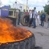 Anti-Haitian protestors burn tires in Los Llanos, Dominican Republic. Credit: Uncommon Productions