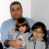 Khaled El-Masri with two of his children. Credit: Joy Garnett