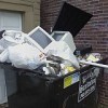 Discarded computer monitors in Minneapolis, Minnesota, where the city has a free pick-up programme. Credit: Bdunnette