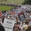 Demonstrators taking part in the Make Poverty History march through the centre of Edinburgh. Credit: Aubrey Wade  / panos pictures