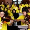 The youth orchestra and choir rehearse at the Guri Project's Julio Prestes centre. Credit: Márcia Zoet, courtesy of Projeto Guri