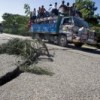 Busloads of people leave Port-au-Prince after a powerful earthquake caused countless fatalities and left the city virtually inoperable.  Credit: UN Photo/Marco Dormino