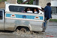 A public transport vehicle sloshes through massive puddles on Gonaives Avenue. Credit: Wadner Pierre A public transport vehicle sloshes through massive puddles on Gonaives Avenue. Credit: Wadner Pierre