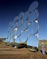 Heliostats, like the one pictured above, collect solar energy for power tower plants. About 5,000 of these would be used in a 100-MW commercial plant. Credit: Sandia National Laboratory Heliostats, like the one pictured above, collect solar energy for power tower plants. About 5,000 of these would be used in a 100-MW commercial plant. Credit: Sandia National Laboratory