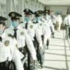 Surgical masks have become part of the Mexican police uniform. Credit: Marcos Ferro Tarasiuk/IPS