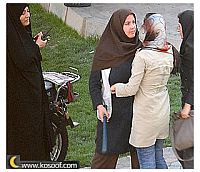 Iranian policewomen (dressed in black and brown) confront women&#39s rights activists at a rally in Tehran on Jun. 12, 2006. Credit: Arash Ashoorinia/kosoof.com