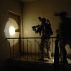 Two U.S. Army soldiers search a building for weapons caches in Baghdad on Apr. 16, 2008. Credit: US Defence Dept/Spc. Lester Colley