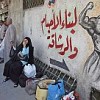 Many new Iraqi arrivals in Syria wait outside of this travel agency in Damascus, either for family members or transport to new accommodations. Credit: UNHCR/M. Bernard