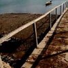 Bleakness surrounds the jetty that leads to Tippin island.  Credit: Zofeen Ebrahim/IPS