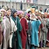 Kashmiri women queue up to cast their ballots for the state assembly polls. Credit: Athar Parvaiz/IPS