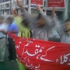 A &#39flash protest&#39 by citizens in support of arrested lawyers -- their faces blurred for anonymity Credit:  SOS