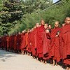 Monks queue up to receive alms in Mandalay.  Credit: Mizzima News 