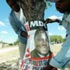 An MDC campaign poster goes up - but is it too little, too late? (Photo: AP) Credit: PictureNET Africa