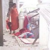 A monk surveys mayhem in a monastery following an army raid Credit: US Campaign for Burma
