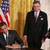 Obama signs a presidential memorandum on Jan. 26, 2009. Credit: White House photo