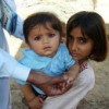 Finger markings prove that this child has received oral polio vaccine.  Credit: Zofeen Ebrahim/IPS
